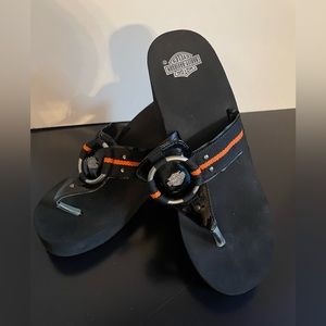 Pair of Harley Davidson wedge sandals.